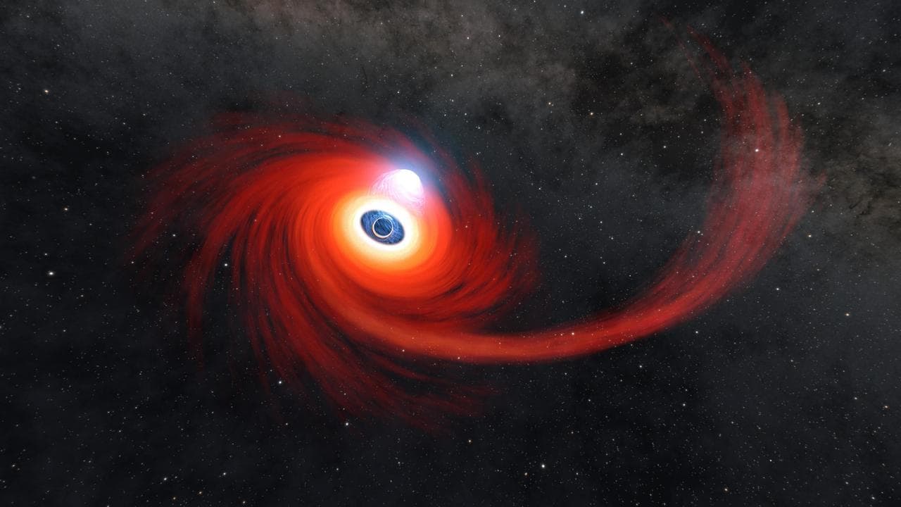 Illustrazione artistica di un buco nero supermassiccio che divora una stella